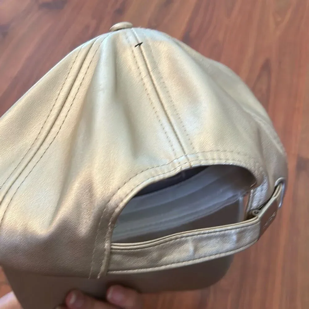 Bebe Gold studded baseball cap leather like